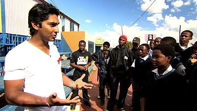 THINK WISE champion and Sri Lanka captain, Kumar Sangakkara, talking to youngsters at a love Life project, South Africa, about HIV and AIDS awareness.